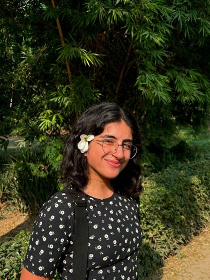 A beautiful portrait of a young poet, finding a moment of peace and inspiration during one of our outdoor community events.