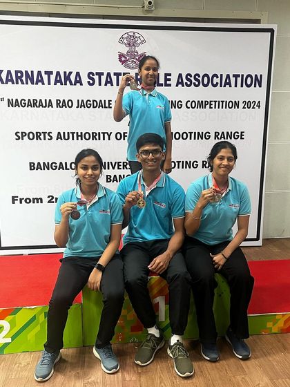 Our successful 25m and 50m shooters celebrating their medal wins.
