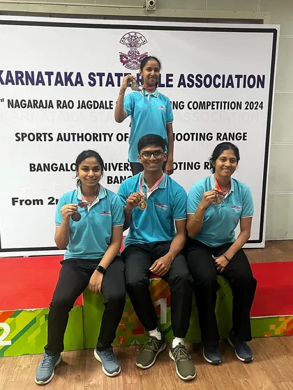 Our successful 25m and 50m shooters celebrating their medal wins.