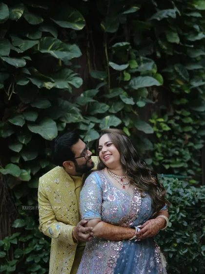 A close-up, intimate embrace of the wedding couple, filled with love and happiness.