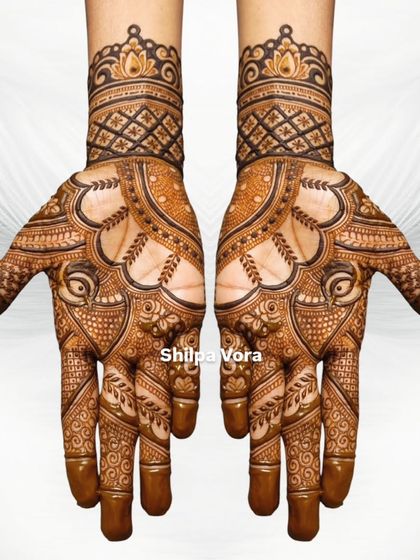 A clean, symmetrical shot of a traditional design against a white background, emphasizing the precision of the artwork.