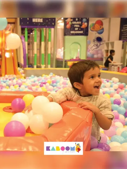 The look of pure excitement! The ball pit is often the first stop for kids when they arrive, and it's easy to see why.