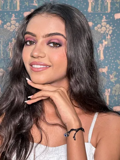 Another angle of the purple halo eye, showing how it looks from the front. The soft waves in the hair complement the bold eye makeup perfectly.