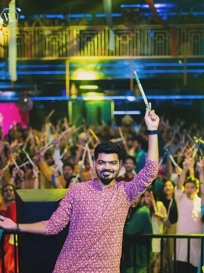 I love bringing the energy to festive events like this Dandiya night. It's amazing to see everyone celebrating, and I always customize my set to match the traditional yet modern vibe.