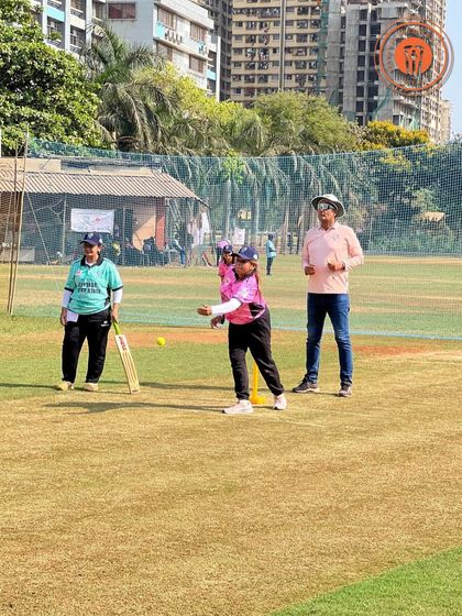 A moment of concentration as a woman bowls during a Parents Premier League game.
