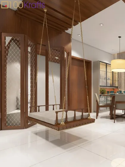I love weaving traditional elements into modern homes. This indoor wooden swing, or 'jhoola', brings a touch of heritage and playful nostalgia into the living space, creating a corner for quiet reflection and joyful moments.