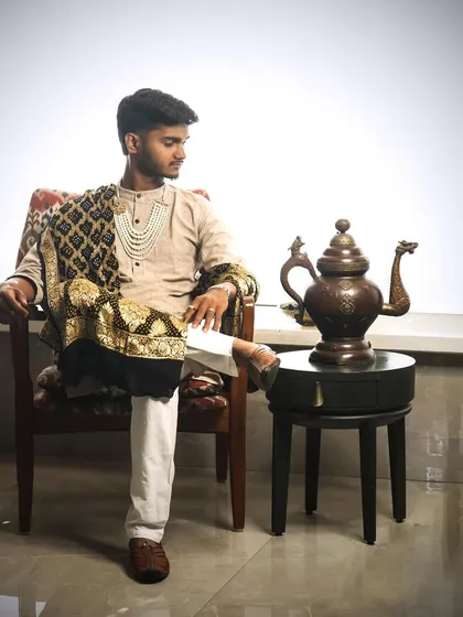 The full ensemble, showing how our men's jewellery can complete a regal, festive look.