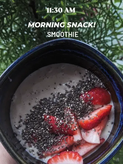 Around 11:30 AM, I'll have a morning snack like this smoothie bowl. Topped with fresh strawberries and chia seeds, it's a perfect way to get in some fiber, protein, and healthy fats to keep me going until lunch.