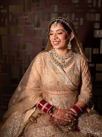 My bride Ria looked like a dream in this golden lehenga. I created a soft, glowing makeup look with a defined eye to match the elegance of her outfit.