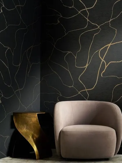 This silk-like textile from Phillip Jeffries shimmers with stunning luster. The free-flowing metallic lines on a dark background add pattern, movement, and a touch of organic elegance to the space.