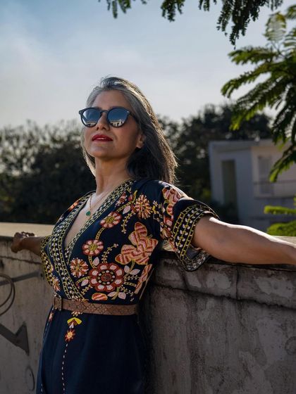 A sunny day look featuring a floral embroidered jumpsuit. This is a perfect example of an outfit that is stylish, comfortable, and makes a statement.