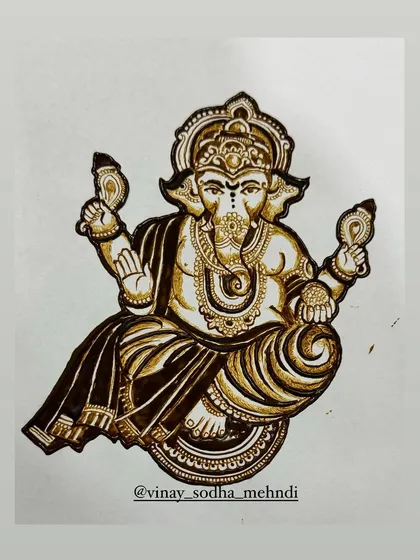A classic, seated Ganpati figure drawn on paper. This is a foundational design that every professional mehndi artist should master.