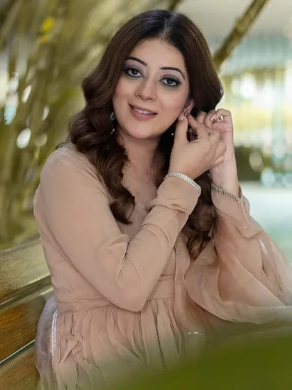 A lovely portrait capturing a natural smile. This kind of image connects with the viewer and brings a sense of warmth and personality to the fashion brand.