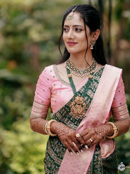 Another lovely shot of Ankita in her engagement attire. The subtle line work on the blouse sleeves adds a touch of modern sophistication.