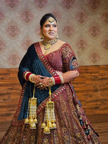 A full-length shot of our beautiful bride. Her confidence and joy are the best accessories to this royal bridal look.