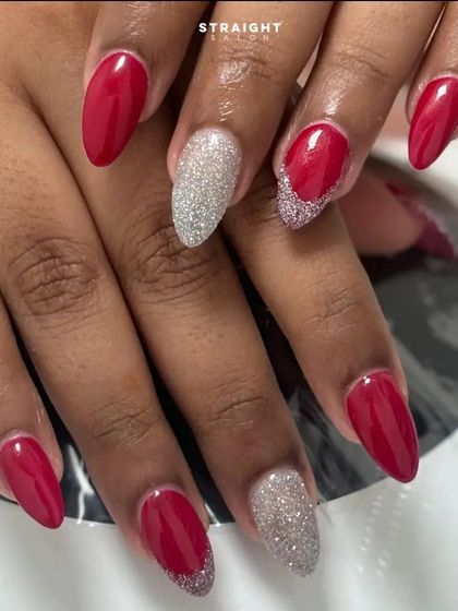 A final look at the beautiful red and silver glitter manicure, perfect for any celebration.
