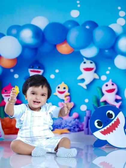 This little shark is showing off his favorite toy in our colorful and fun underwater world.