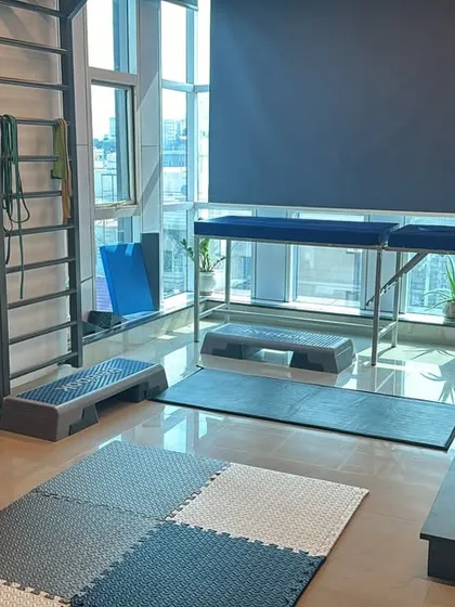 Welcome to my clinic. I designed this space specifically for exercise-based therapy, free from electrical gadgets. It's a place where we use movement, simple tools, and focused effort to help you heal and get stronger.