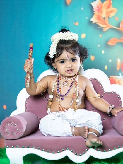 A slightly mischievous look from our little Krishna.