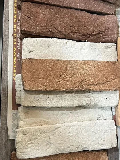 A selection of natural wall cladding options we use, made from Indian rock and clay. By choosing these materials over artificial alternatives, we create spaces that are sustainable, beautiful, and deeply connected to their environment.