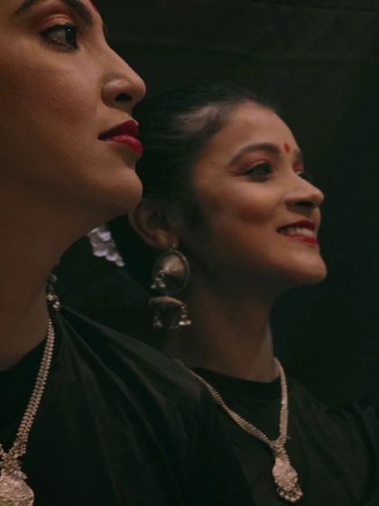 Another moment from my Navratri 'Shakti' series with a friend. Our coordinated profiles and expressions reflect the friendship and shared energy that dance, especially Garba, fosters among women.