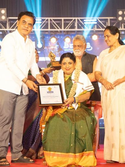 A photograph from the Shivaratri Utsava award ceremony, capturing the moment of receiving the honor. Such events bring together the artistic community and celebrate our collective contributions.