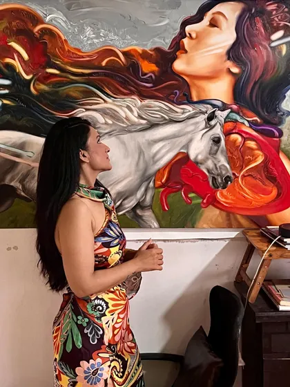A profile view of a visitor admiring the details in my "Soulmates" painting. The textures and fine brushwork are best appreciated up close.