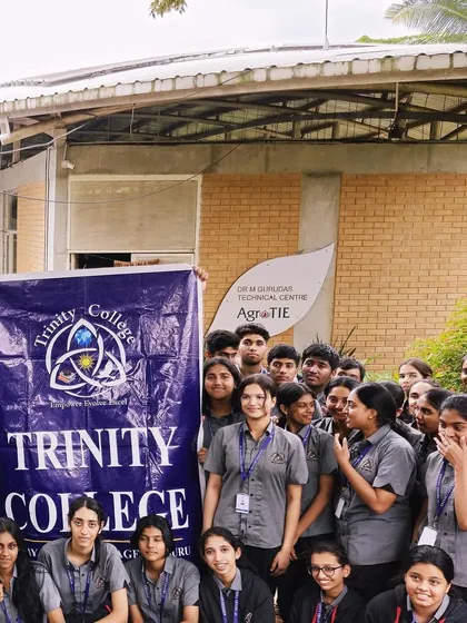 Students from Trinity College, Mysore, proudly display their college banner during their industrial visit to AgroTIE. We were delighted to host 100 students for this educational day.