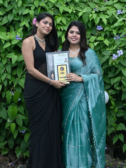 Congratulations to this bright artist on her graduation. The certificate and trophy are symbols of her commitment, and I am excited to see the beautiful work she will create in the future.