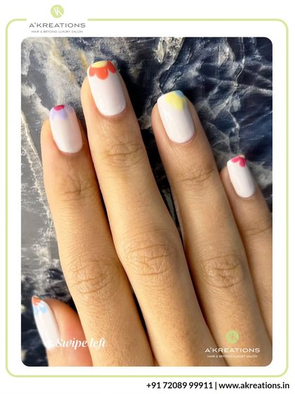 This perspective shows the full hand with the colorful floral cuticle art, a perfect design for spring or a subtle pop of color.
