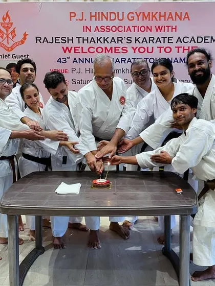 Celebrating our academy’s 44th Anniversary. Our founder, Kyoshi Sensei Rajesh Thakkar, cuts the cake surrounded by his senior instructors, marking another year of dedication to teaching Karate-do.