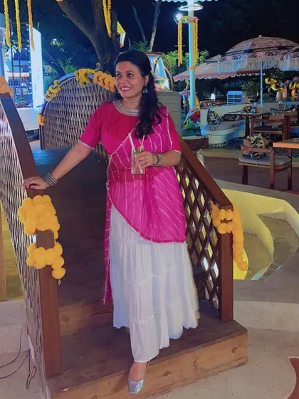Posing on a bridge decorated with marigolds. The entire city feels like a celebration during Navratri.