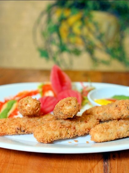 Our crispy fried fish fingers are a great appetizer to share with friends.