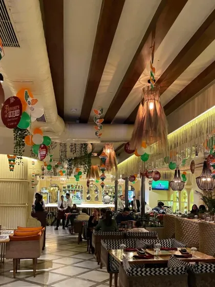 Another angle of the Republic Day decor, showing how hanging decorations and themed cutouts can transform a large dining area for a corporate event or public celebration.