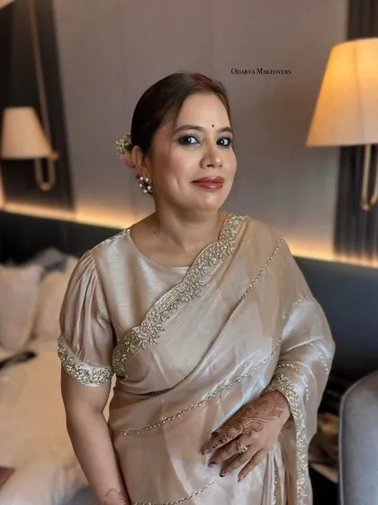 This client looked absolutely gorgeous in her organza saree. I created a soft, classic makeup look to match her elegant style.