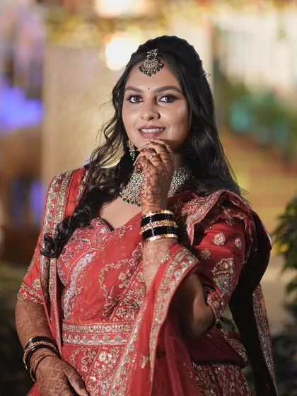 A confident and happy bride at her reception. The makeup is designed to be photogenic and last all night.