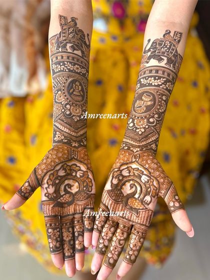 A full view of the peacock and elephant bridal design, showcasing its regal and traditional feel.