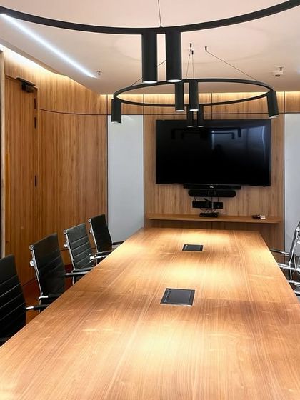 Our state-of-the-art conference room in the new Bengaluru office, equipped with the latest technology to facilitate seamless client meetings and internal collaboration.