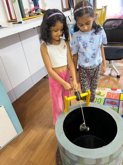 A simple pulley system in action. We use models like this well to teach kids the basics of mechanical engineering and how simple machines make work easier.
