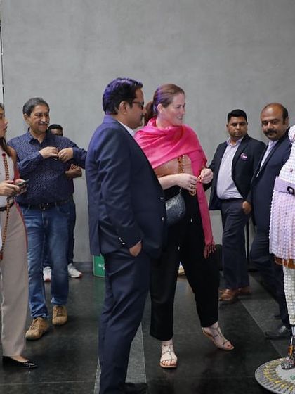 Visitors at my Nexus Mall exhibition interacting with the 'Avatara' sculpture. It's always rewarding to see people engage with the work and learn about the materials used.