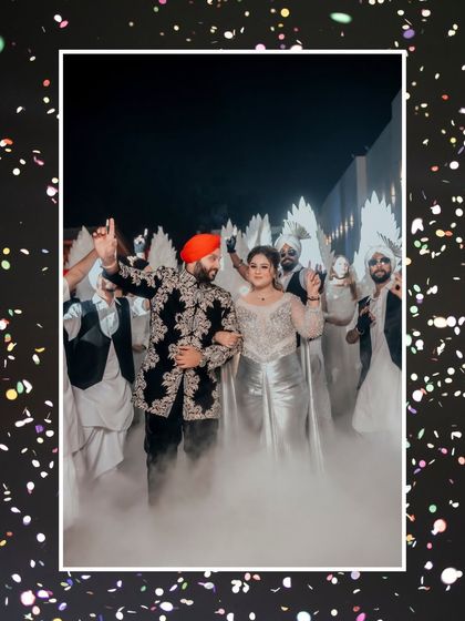 A fun, celebratory shot of Gurbani and Gurneet dancing through a cloud of smoke, surrounded by their friends. The confetti border adds to the party atmosphere.
