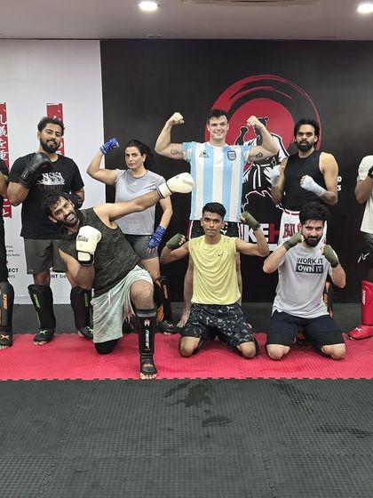 A fun group photo before one of our coaches goes on vacation. We celebrate each other's milestones, big and small.