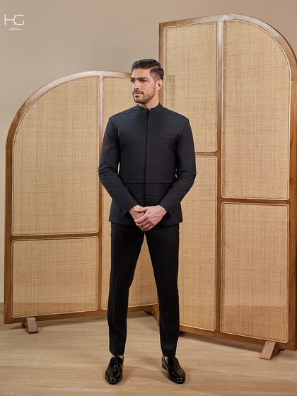 A full view of my clean-fit bandhgala, showing how the tailored trousers and polished loafers complete a look of understated and confident style.