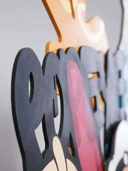 A macro shot of the graffiti lettering in the Popeye artwork. Even the text is layered, adding another level of depth to the entire piece.