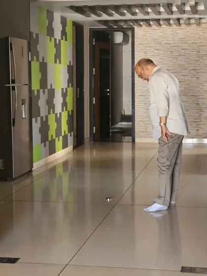 Here I am activating the Brahmastan (center point) of a home. This is a crucial step in my Energy Vastu process to ensure positive energy radiates throughout the entire living space.