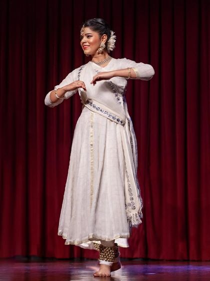 On stage is where I feel I am living my dream. This photo, in a classic white Kathak costume, was taken during a performance that reminded me how much I cherish this artistic life.