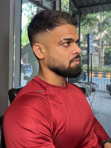 The full view of this Virat Kohli inspired haircut. A sharp look for a cricket fan.
