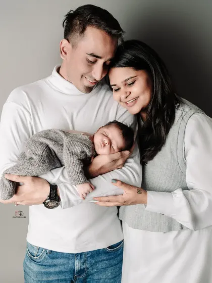 A slightly wider shot of this beautiful new family. These classic studio portraits are perfect for displaying in your home and sharing with loved ones.