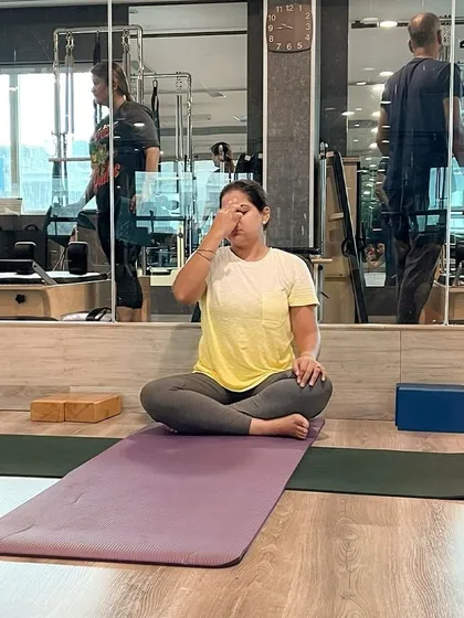 The power of breath is central to our practice. Here, a client practices Pranayama, or conscious breathing, a technique we teach to calm the nervous system and bring awareness to the present moment.