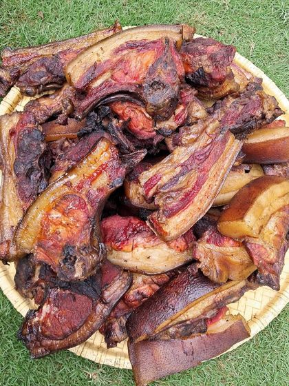 A platter of our traditionally smoked pork, fresh from Nagaland. You can see the rich color and texture that comes from being slowly smoked over a wood fire, a preservation method passed down through generations.